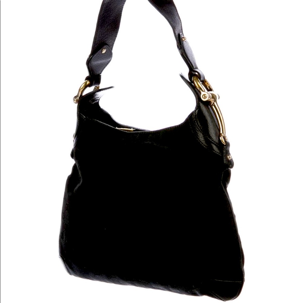 Gucci bag with Gucci logo canvas and leather strap